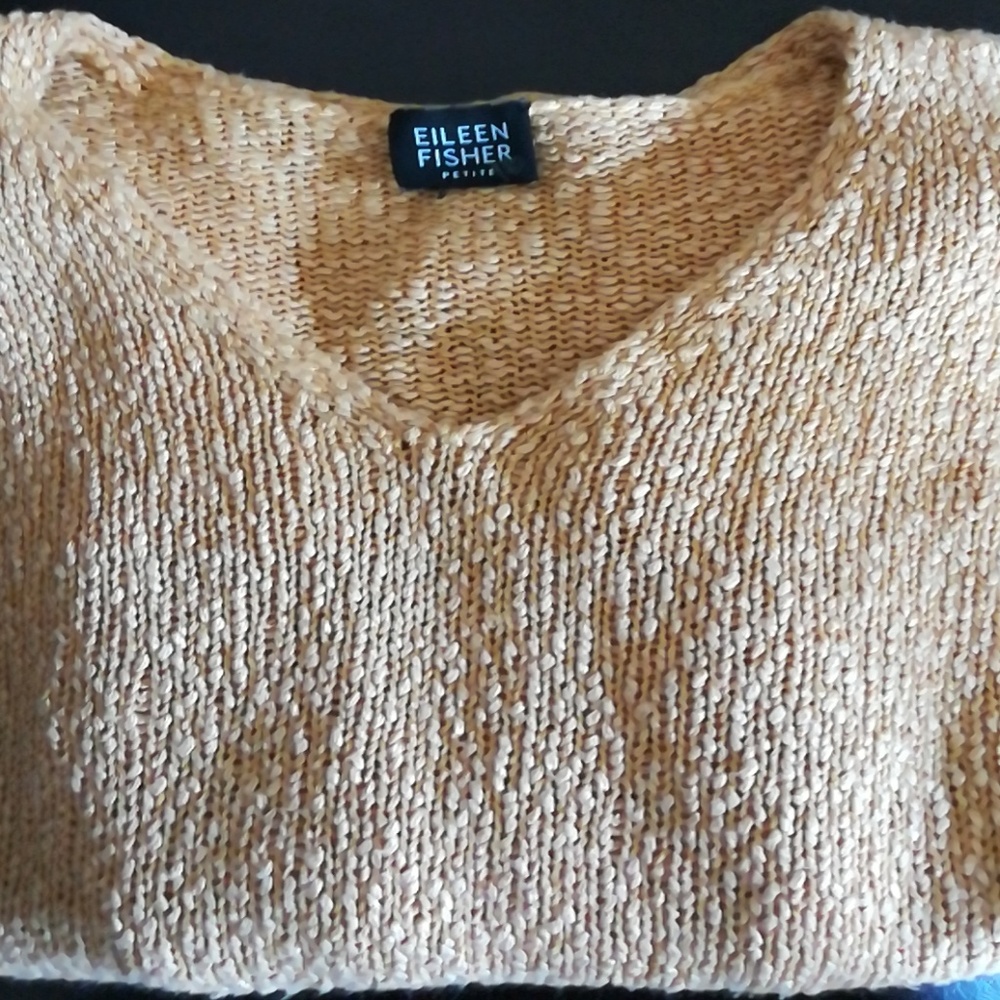 Lightweight soft yellow sweater.